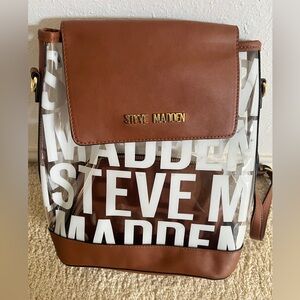 Brand New Steve Madden clear logon backpack with pouch included